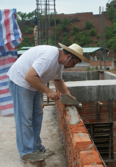 Jimmy building a wall in China