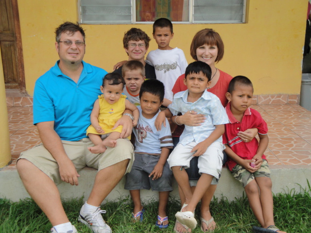 Jimmy, DeAnna and Taylor with children at an orphanage in Tocoa, Honduras.